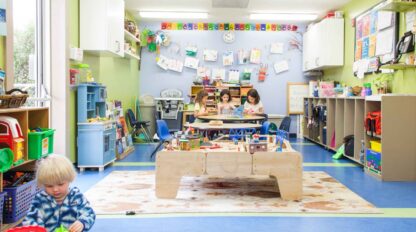 Children in a room with toys and games playing together