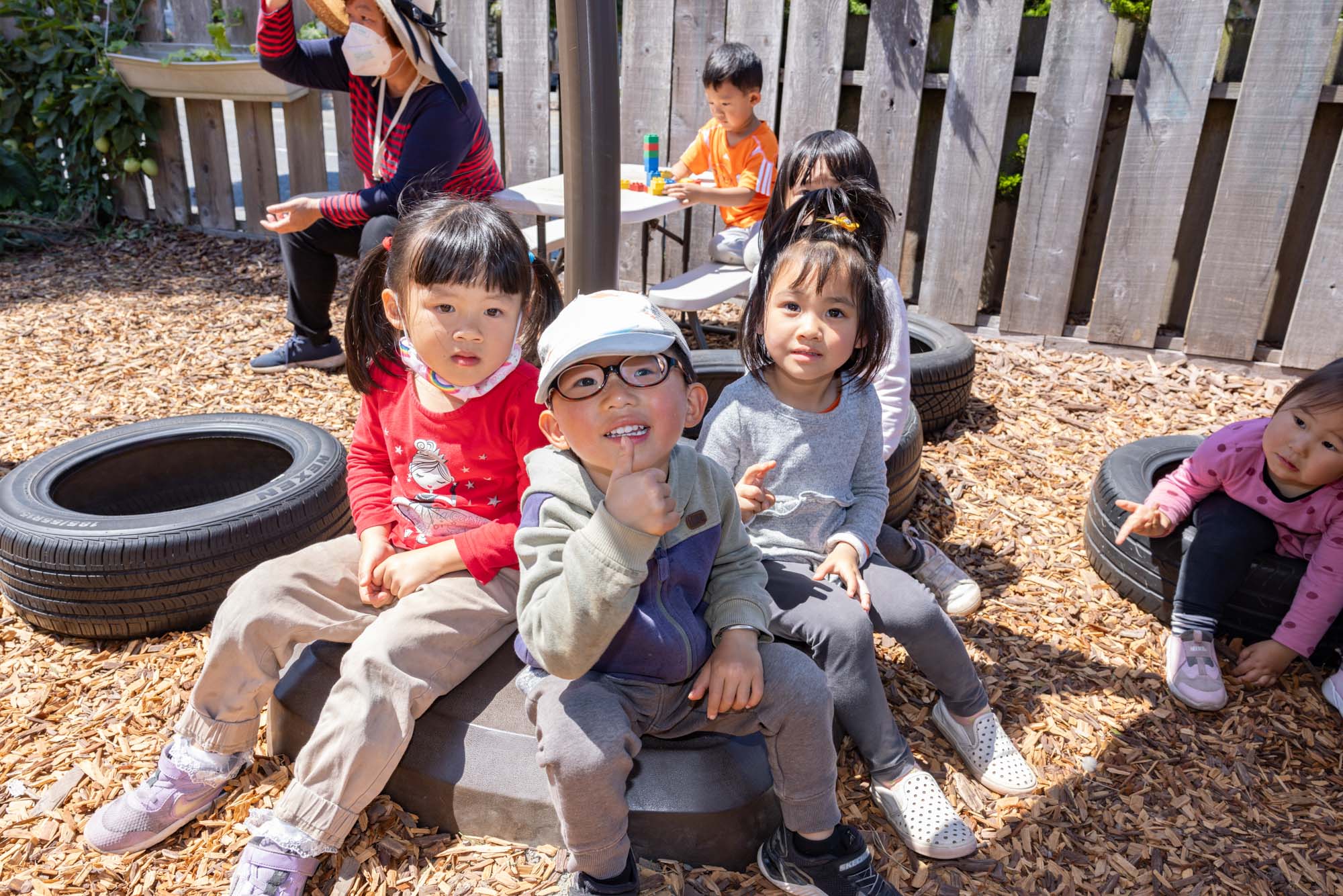 Three preschool children.